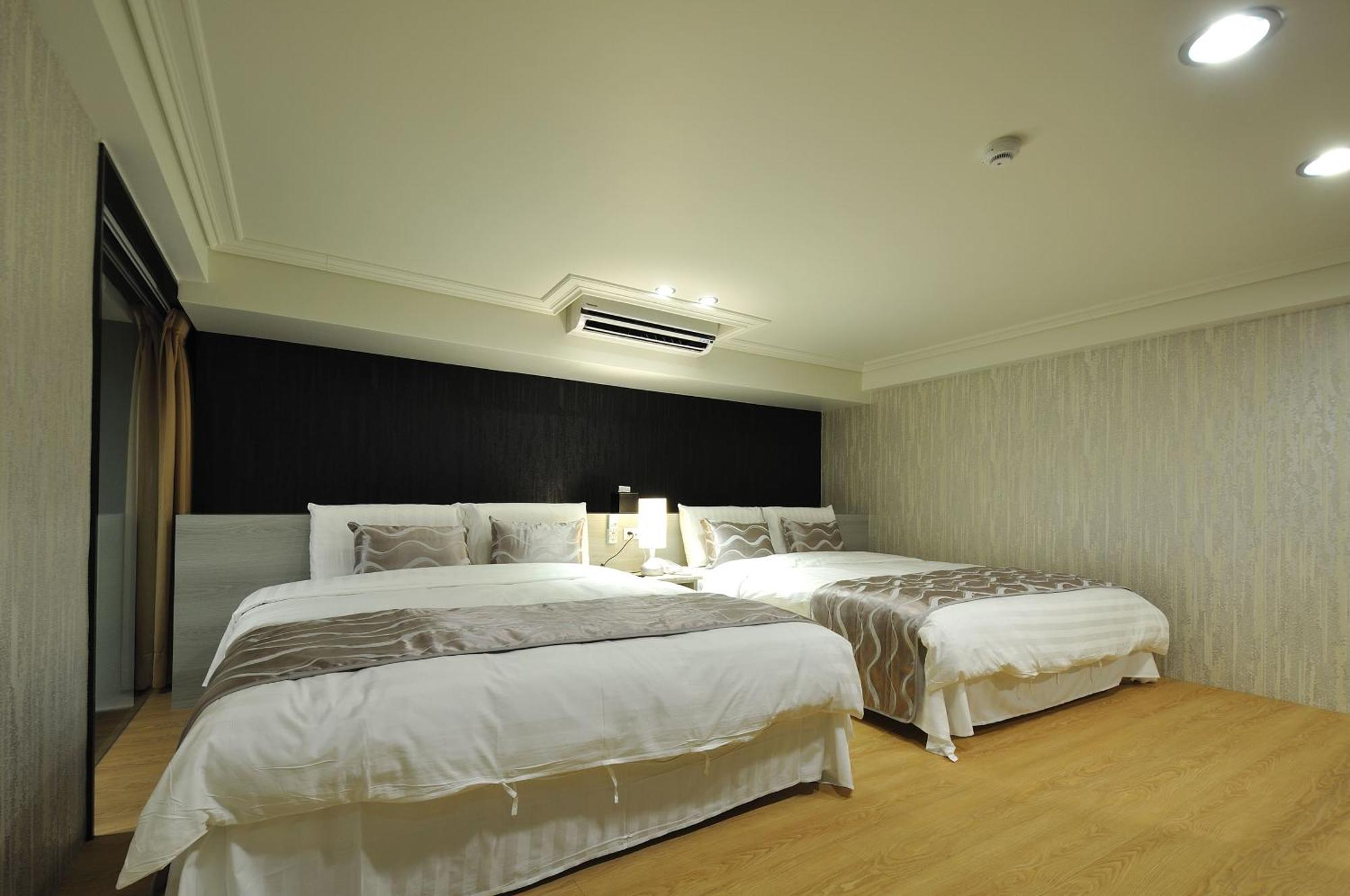 58˚ Hotspring Hotel Jiaoxi Rum bild