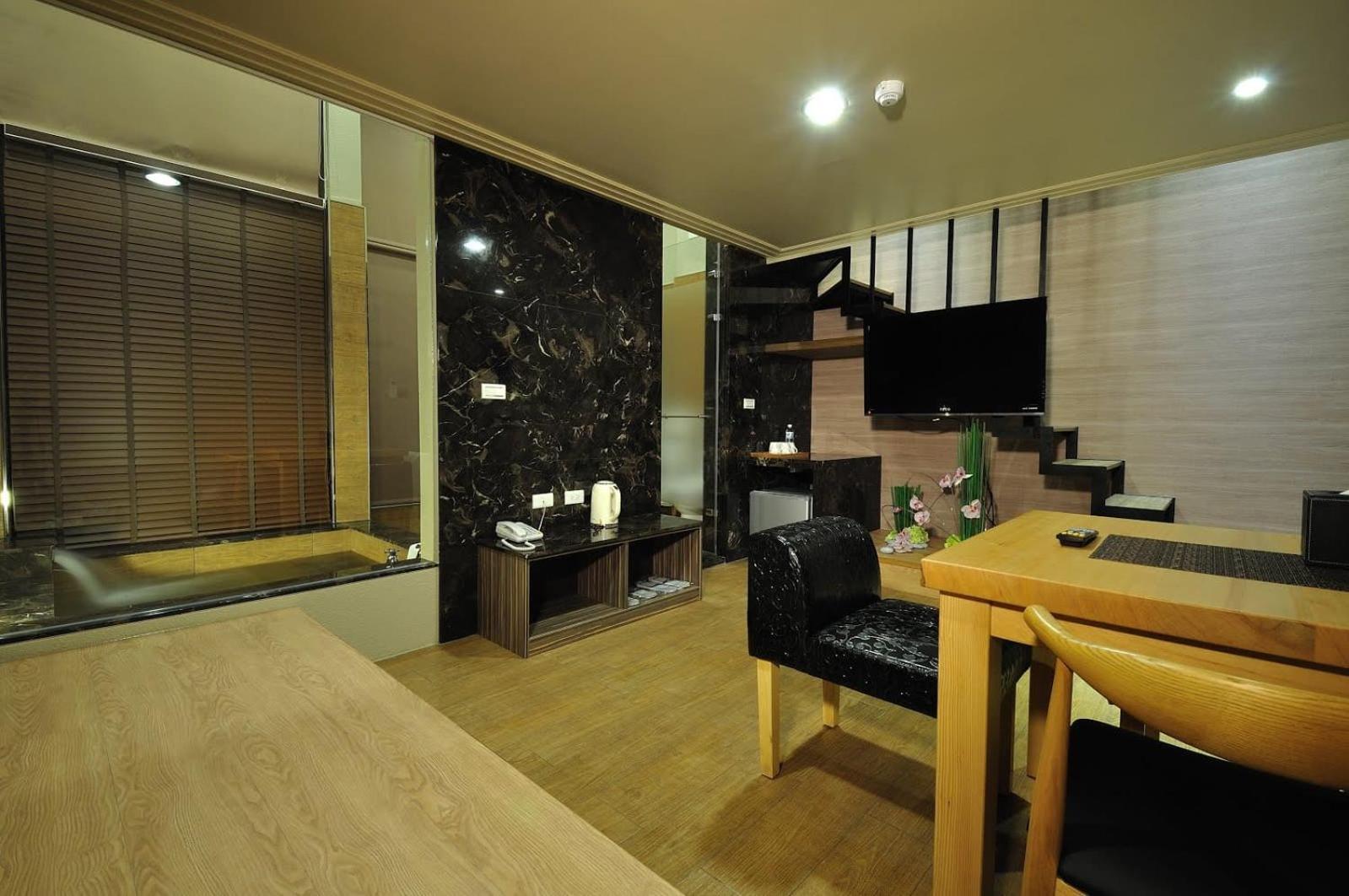 58˚ Hotspring Hotel Jiaoxi Rum bild